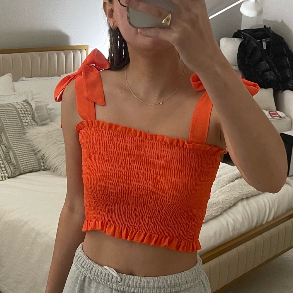 Bright orange ribbed crop top